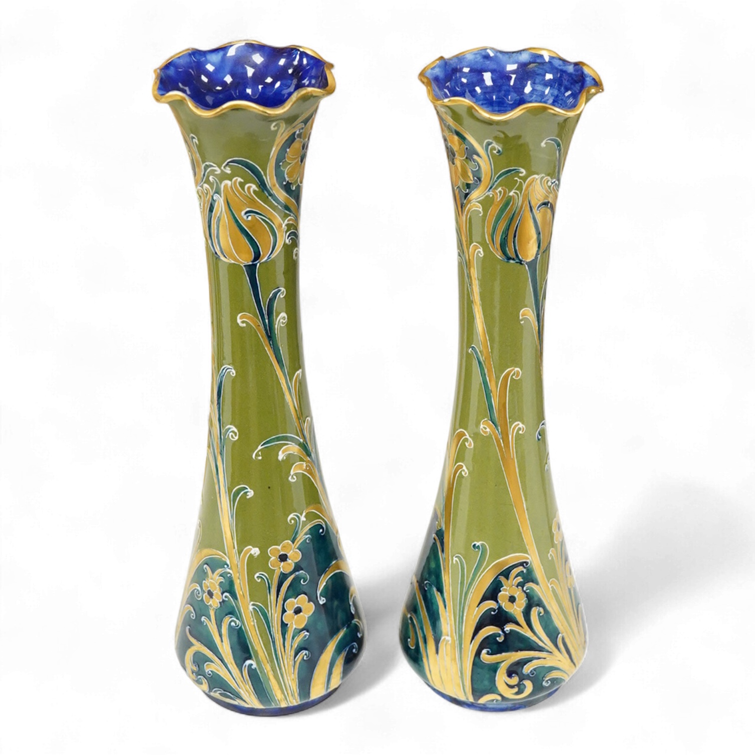 A pair of early 20th century Moorcroft MacIntrye Florian green and gold vases, signed and stamped to the bases, 29cm high